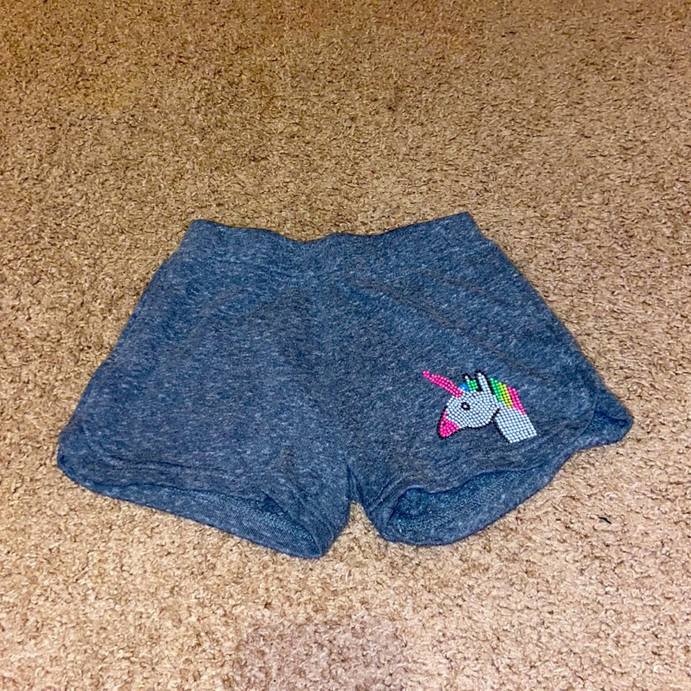 Gray comfy shorts with a unicorn on it